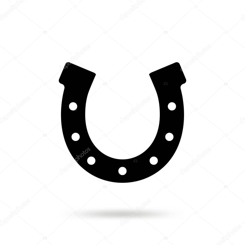 Simple black horseshoe vector icon isolated on white background. Horse shoe silhouette as international good luck symbol. Fortune and success sign