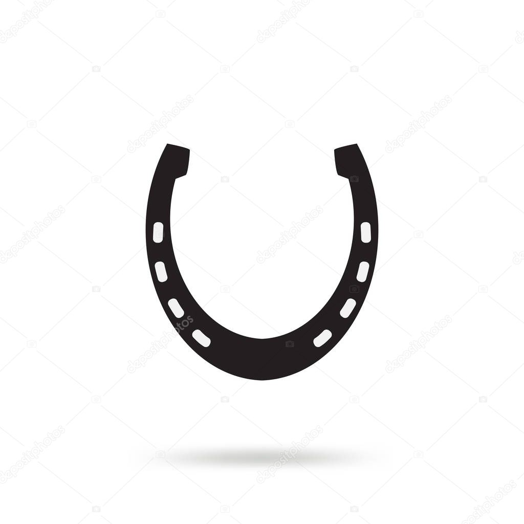 Simple black horseshoe vector icon isolated on white background. Horse shoe silhouette as international good luck symbol. Fortune and success sign
