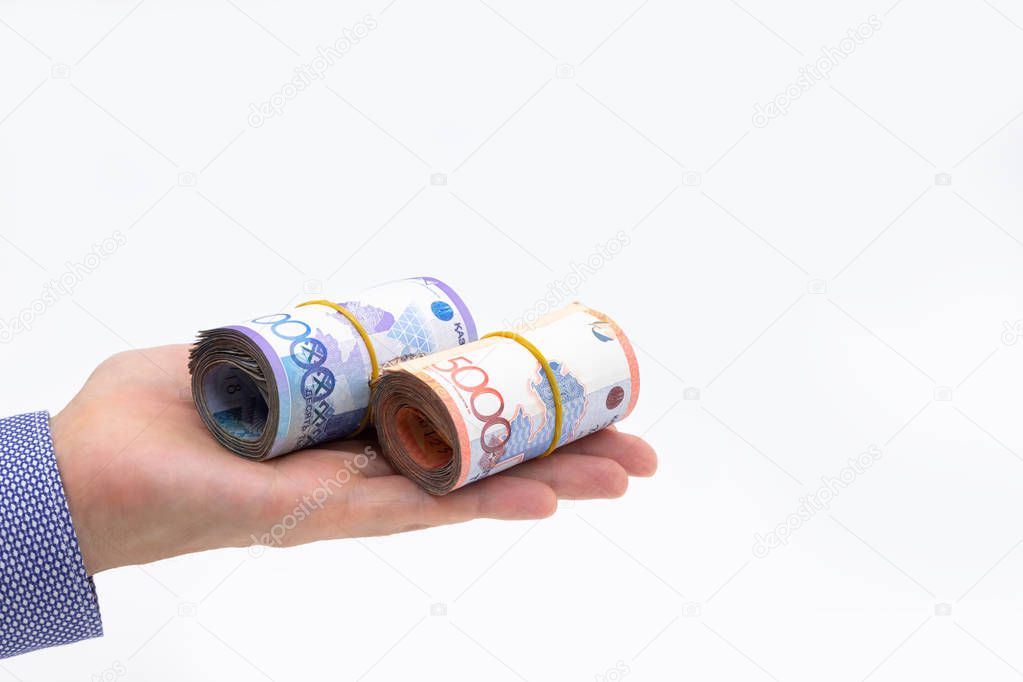 Rolls of tenge banknotes