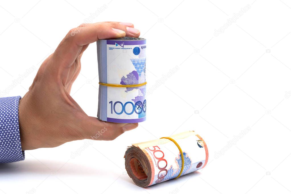 Hand rolls of banknotes