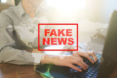 Sanal ekran üzerinde sahte haber uyarı.