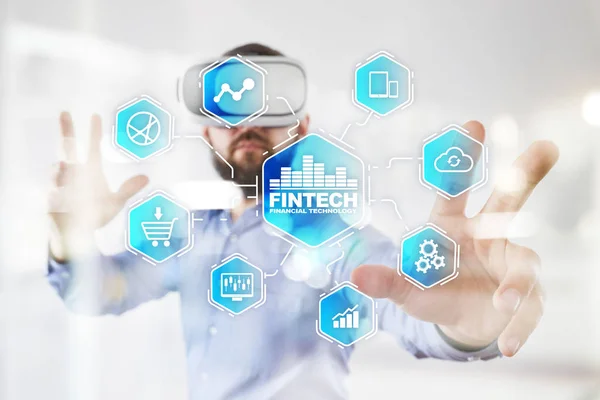 Fintech. Financial technology text on virtual screen. Business, internet and technology concept