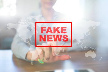 Sanal ekran üzerinde sahte haber uyarı.