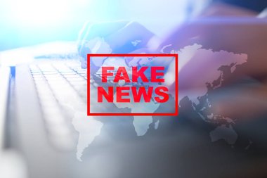 Sanal ekran üzerinde sahte haber uyarı.