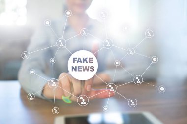 Sanal ekran üzerinde sahte haber uyarı.