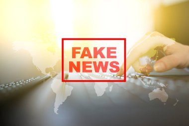 Sanal ekran üzerinde sahte haber uyarı.