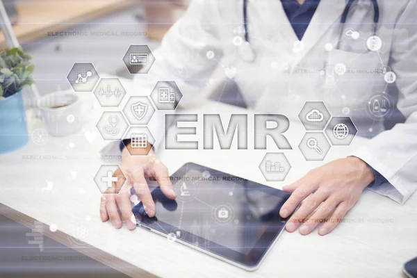 Electronic health record. EHR, EMR. Medicine and healthcare concept. Medical doctor working with modern pc.