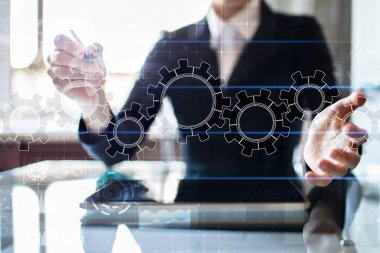 Sanal ekran üzerinde vites. İş strateji ve teknoloji kavramı. Otomasyon işlemi.