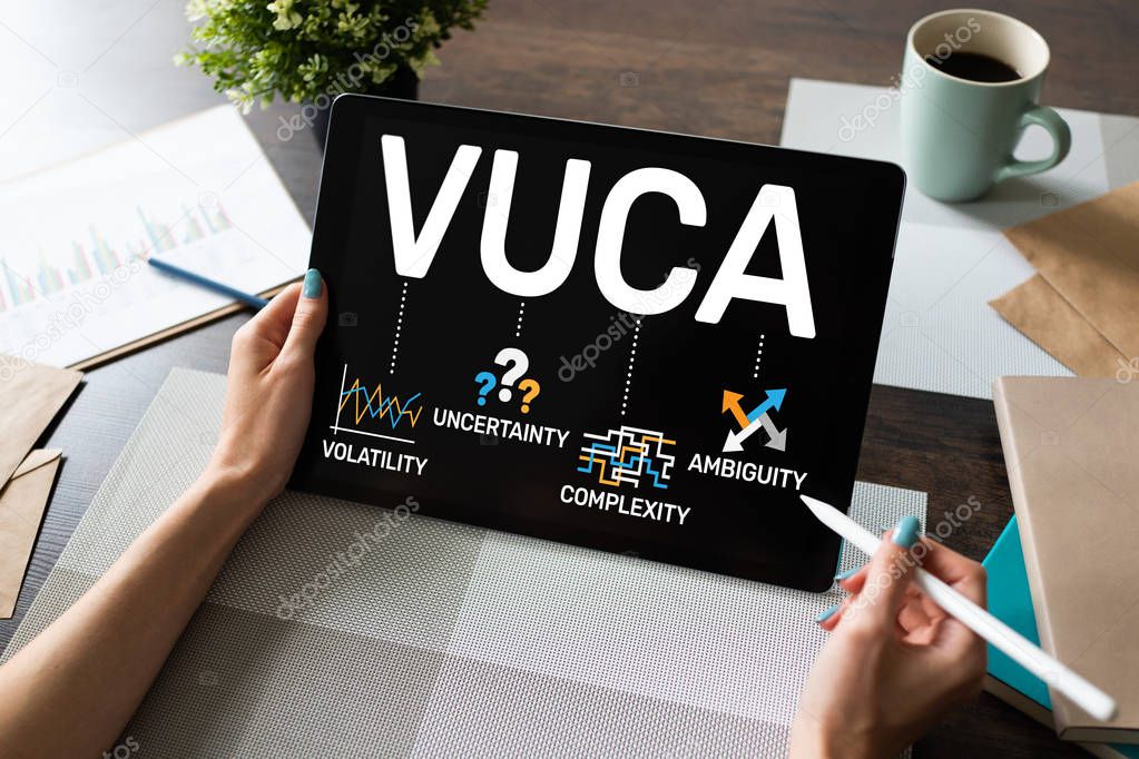 VUCA world concept on screen. Volatility, uncertainty, complexity, ambiguity.