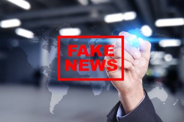 Sanal ekran üzerinde sahte haber uyarı.