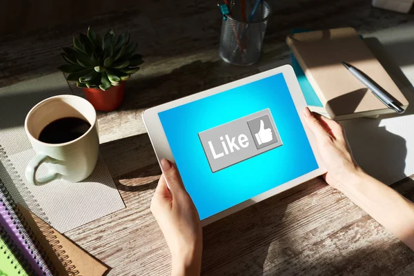 Like button on screen. SMM, Social media marketing concept.