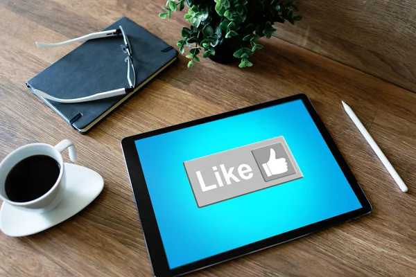 Like button on screen. SMM, Social media marketing concept.