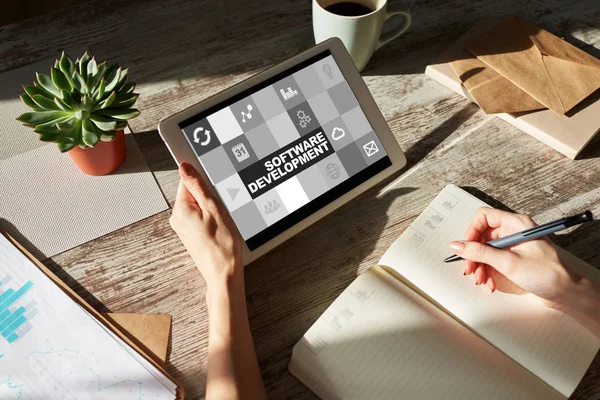 Software development and process automation concept on tablet computer screen