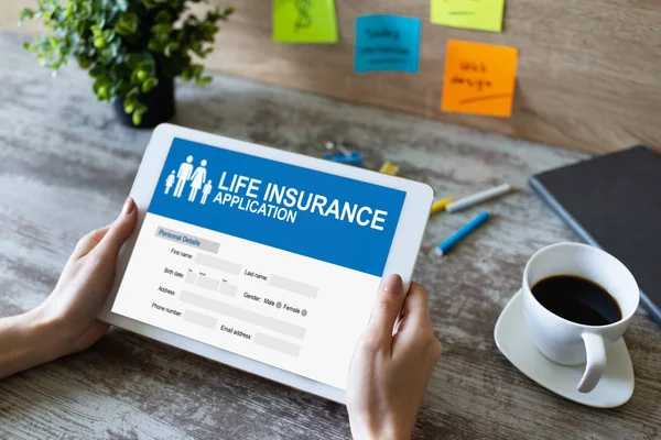 Life insurance online application form on device screen.