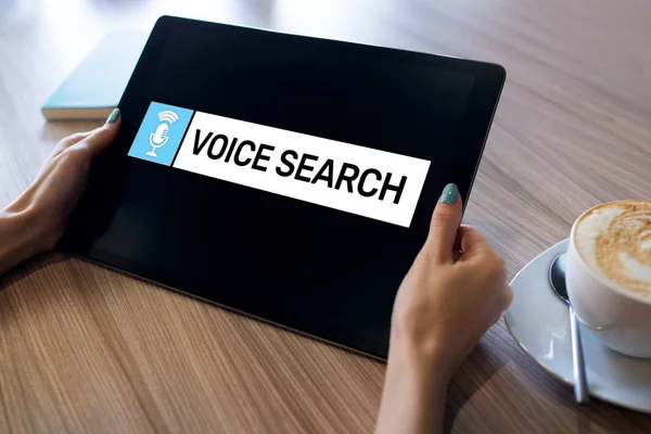 Voice search application on device screen. Internet and technology concept.