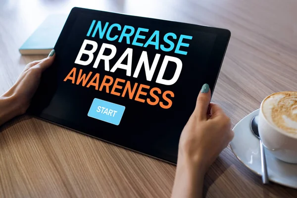 Increase brand awareness text on screen. Advertising and marketing concept.