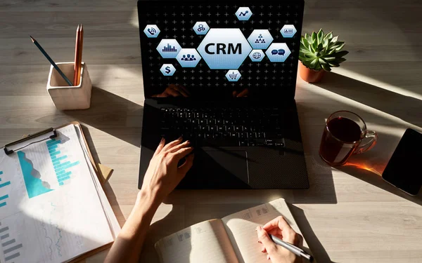 CRM - customer relationship management system concept on screen.