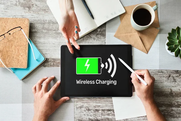 Wireless charging icons and progress bar on device screen.