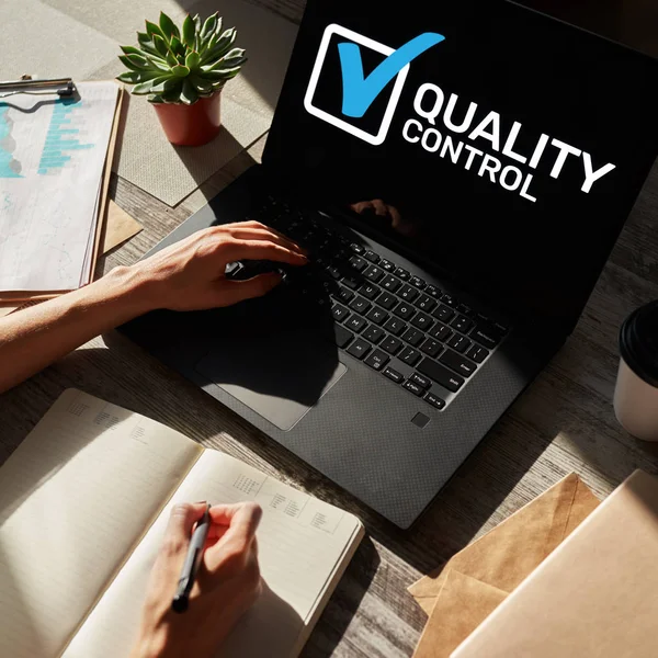 Quality control check box on device screen. Standards and certification, assurance, guarantee. Business concept. — Stock Photo, Image