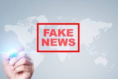 Sanal ekran üzerinde sahte haber uyarı.