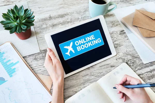 Flight ticket booking online service on device screen. Internet and technology concept.
