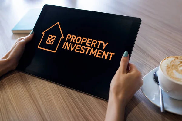 Property investment. Business and finance concept on device screen.