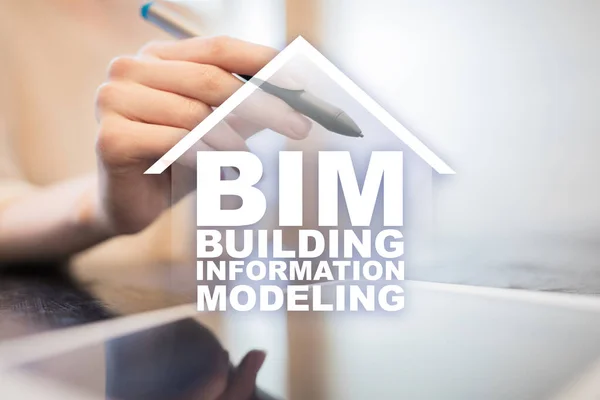 BIM - Building information modeling concept on virtual screen.