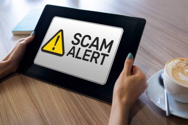 Dolandırıcılık alarmı uyarısı. Aygıt ekranında bildirim.