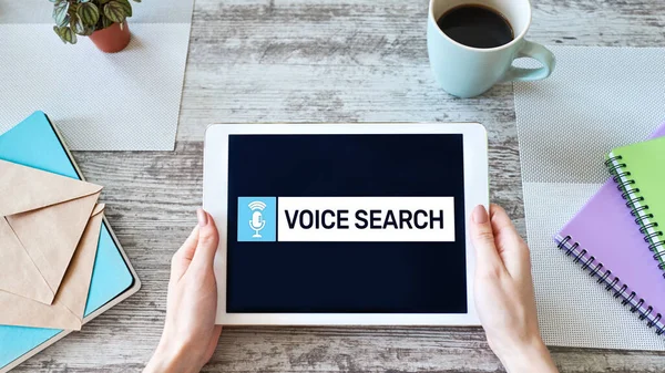 Voice search application on device screen. Internet and technology concept.