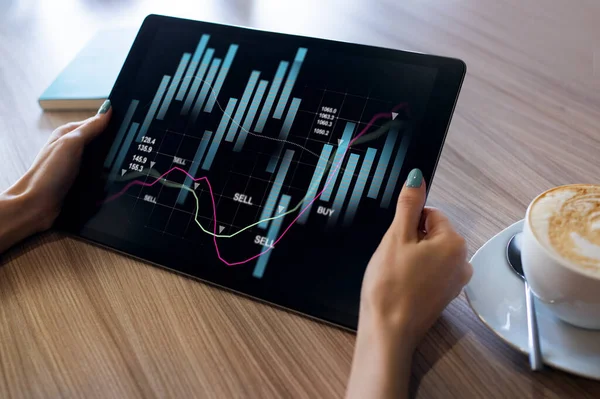 Financial graphs on device screen. Online Investment and stock trading concept. — Stock Photo, Image