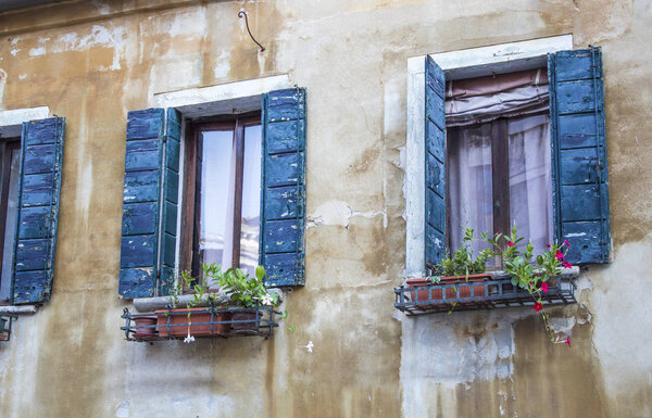 Facade of traditional old house in Venice, Italy