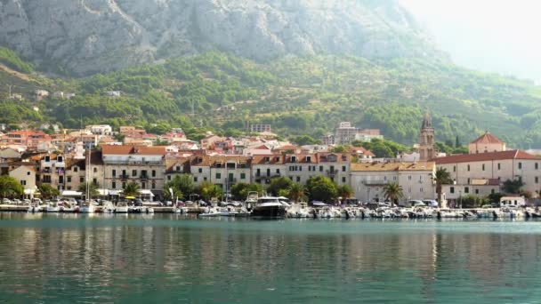 Europe. Croatia. View of the town of Makarska from the sea summer day — Stock Video