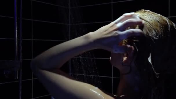 Young woman taking a shower in a beautiful bathroom — Stock Video