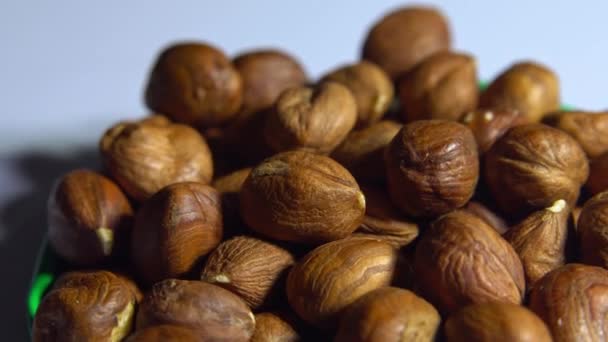Smooth rotation of hazelnut kernels close-up — Stock Video