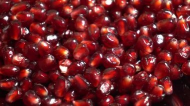 taze kırmızı nar tohumları yavaş dönme