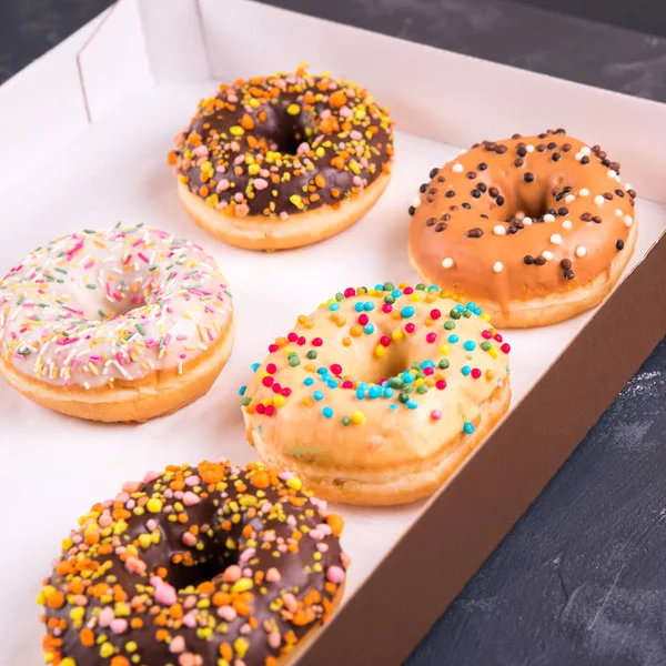 box of sweet fresh donuts with filling