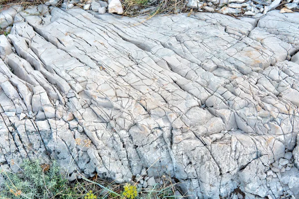 Fond abstrait de vieux gros plan de roche fissurée — Photo