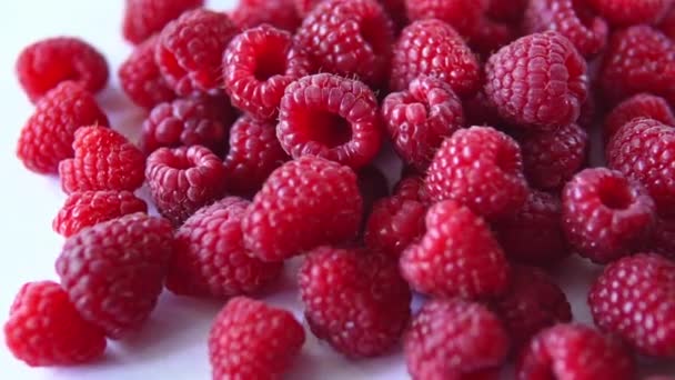 Close-up rotation. Red raspberry spinning on the table — Stock Video