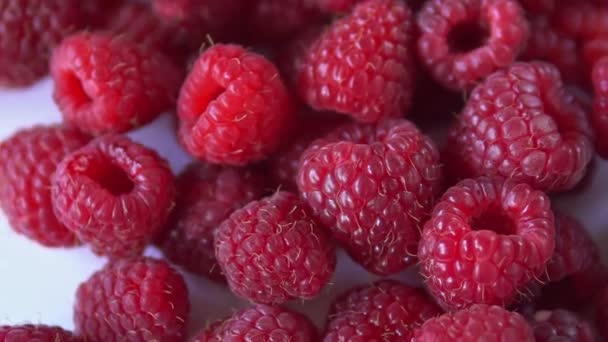 Close-up rotation. Red raspberry spinning on the table — Stock Video