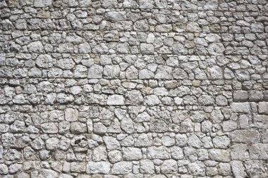 taşlardan yapılmış kale duvarı nın parçası