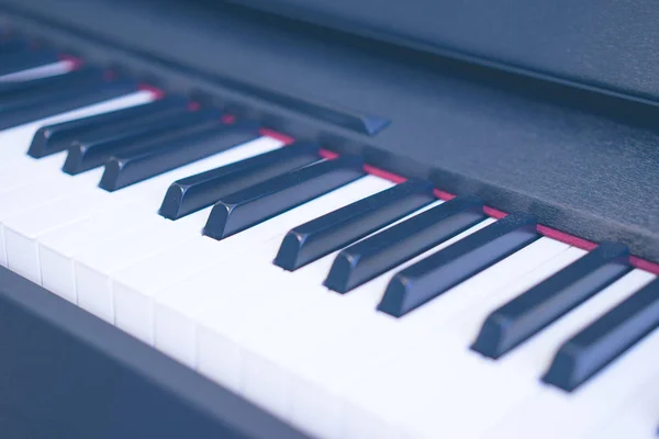 Old piano in the music practice room with beautiful music in vintage tone.