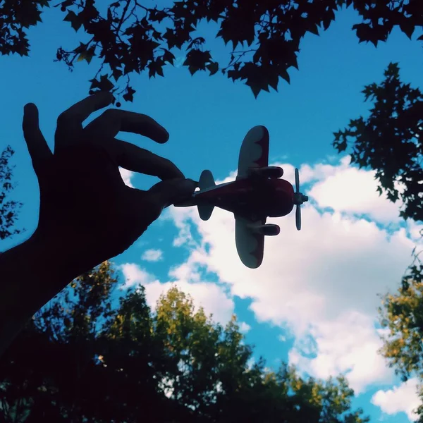 Low Angle View Woman Hand Holding Toy Airplane — Stock Photo, Image