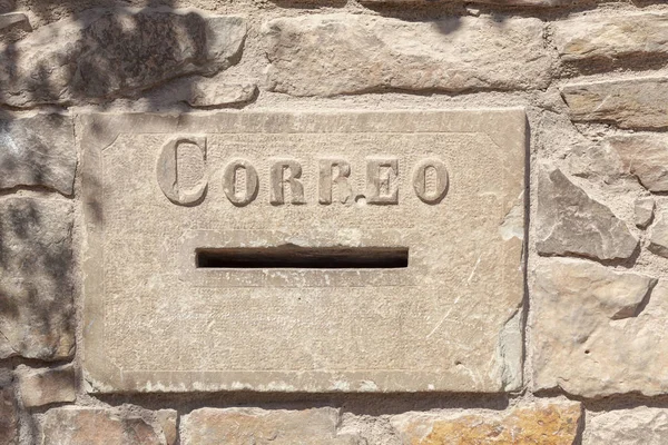 Ancient mail box,stone wall, Correo.