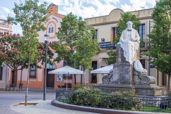 COLÔNIA GUELL-SANTA COLOMA DE CERVELLO, SPAIN- Praça Litte na aldeia da cidade da empresa, colônia guell . Fotos De Bancos De Imagens