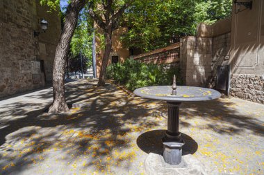 Little square in historic center of Sarria district of Barcelona clipart