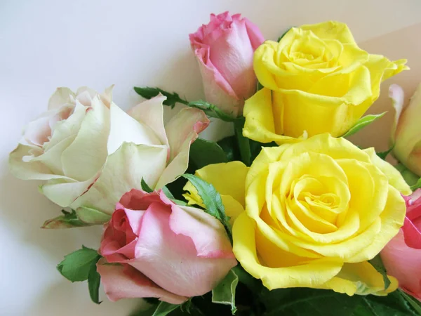 Beautiful bouquet of real roses. Floral background of colorful flowers.