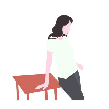 young woman sitting on a wooden table with an elegant pose