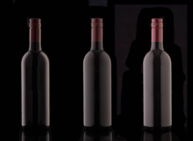 Siyah bir zemin üzerine kırmızı elit şarap şişe. Bir şişe şarap kırmızı bir tıpa ile silüeti.