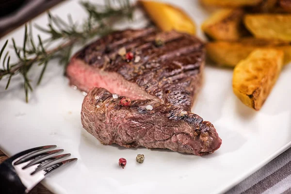 Beef Steak Fried Potatoes Slices White Rectangular Plate Restaurant — Stock Photo, Image