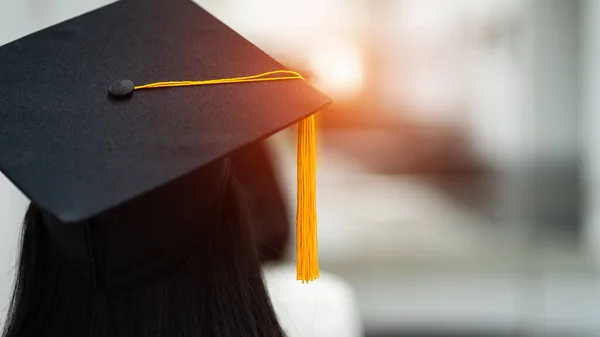 Review of the success university graduate hat during commencement. Concept of successful in education. University congratulation ceremony. Education stock photo.